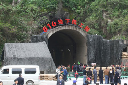 Tourists visit part of the China 816 Nuclear Military Plant in Fuling District in southwest China's Chongqing municipality on Saturday, April 24, 2010. The abandoned nuclear plant known as the world's largest artificial cave has been opened to the public as a tourist attraction for the first time. [Photo: Xinhua] 