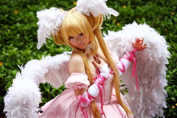 A cosplay fan puts on a unique pose of cartoon figure during the two-day Asian Cosplay Innovative Creation Exhibition in Taipei, Taiwan, April 24, 2010. More than 1,000 cosplay fans took part in the exhibition. 