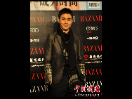 Chinese actor Ruan Jingtian attends the 2010 BAZAAR Star Charity Night gala in Shanghai, April 25, 2010. A total of 400 showbiz stars, entrepreneurs and celebrities attended the event.  [Chinanews.com]