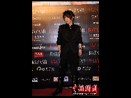 Chinese magician Liu Qian attends the 2010 BAZAAR Star Charity Night gala in Shanghai, April 25, 2010. A total of 400 showbiz stars, entrepreneurs and celebrities attended the event.  [Chinanews.com]