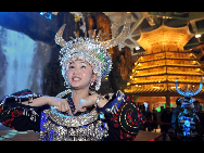 Miss Etiquette in the Guizhou pavilion. [China Daily]