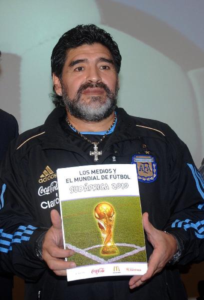 Argentina national team coach Diego Maradona promotes 2010 South Africa World Cup themed books at the Buenos Aires International Book Fair 2010 in Buenos Aires, Argentina, on April 26, 2010. (Xinhua/Roberto Azcarate)