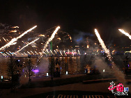 Fireworks explode over the Shanghai World Expo site during a rehearsal for its opening ceremony April 27, 2010. [Photo by Hu Di]