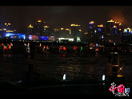 Fireworks explode over the Shanghai World Expo site during a rehearsal for its opening ceremony April 27, 2010. [Photo by Hu Di]