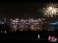 Fireworks explode over the Shanghai World Expo site during a rehearsal for its opening ceremony April 27, 2010. [Photo by Hu Di]