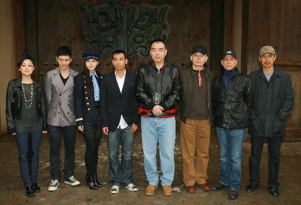 The production team of the film 'Zhao's Orphan' pose at a press conference at the Xiangshan movie production base in Ningbo, Zhejiang Province, April 26, 2010.
