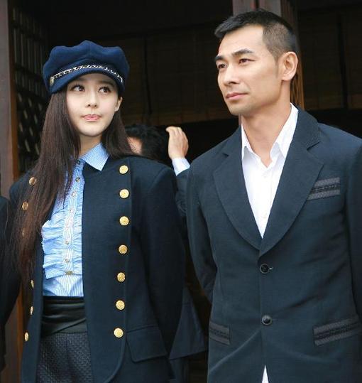 Actress Fan Bingbing and actor Chiu Man-Cheuk pose at a press conference at the Xiangshan movie production base in Ningbo, Zhejiang Province, April 26, 2010. Main cast of the film 'Zhao's Orphan' by director Chen Kaige attends the press conference.
