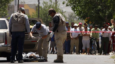 Armed men storm bar in Mexican city, killing 8