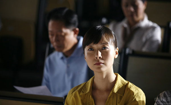 A still of the TV adaptation of Feng Xiaogang's movie 'Cell Phone'. The TV series is to premiere on four satellite channels in China on May 10. Lead cast includes Wang Zhiwen, Chen Daoming, Liu Bei and Ke Lan. The TV version will stay faithful to the original; however, the actors have not sought to imitate performances from the movie. 