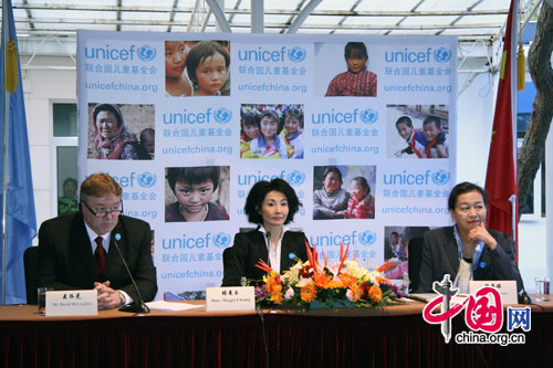 Hong Kong veteran actress Maggie Cheung (center) is appointed as United Nations Children's Fund (UNICEF) ambassador in China in Beijing April 29, 2010. 