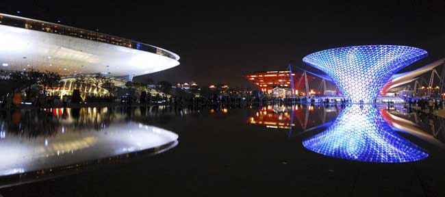 The photo taken on May 2, 2010 shows the 'One Axis and Four Pavilion' area in 2010 World Expo Site in Shanghai, China. The coordinating authority announced the plan of the light, fountain and music show in the Expo Site every hour from 19:00 every day, so as to attract more night visitors. [Xinhua]