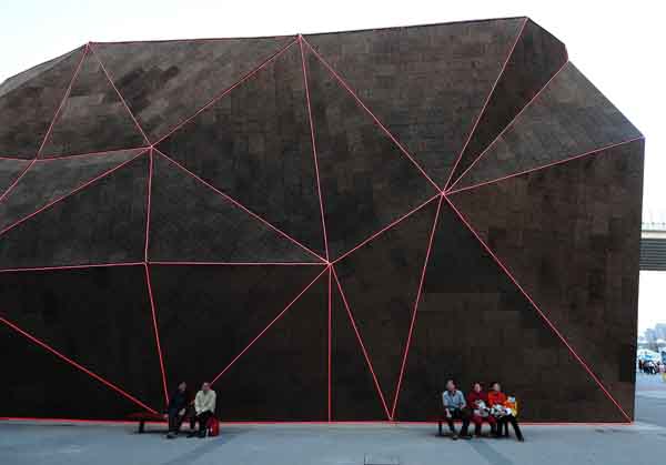 The exterior curtain walls of the Portugal Pavilion are decorated with walls of cork, a Portuguese-sourced, recyclable and environmentally friendly material, in the World Expo in Shanghai, east China, on May 1, 2010. 