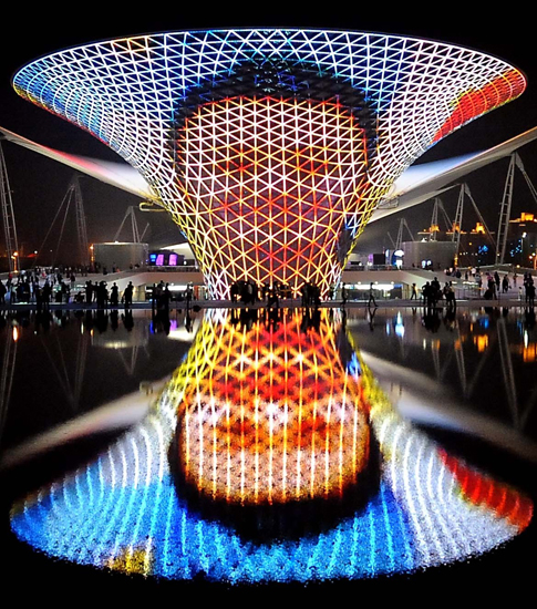 Photo taken on May 2, 2010 shows the Sunshine Valley with the light pattern of a child at the World Expo Park in Shanghai, east China. The night views of the World Expo Park with multicolored lights and various illumination effects give visitors different impression from the daytime. [Wang Song/Xinhua]