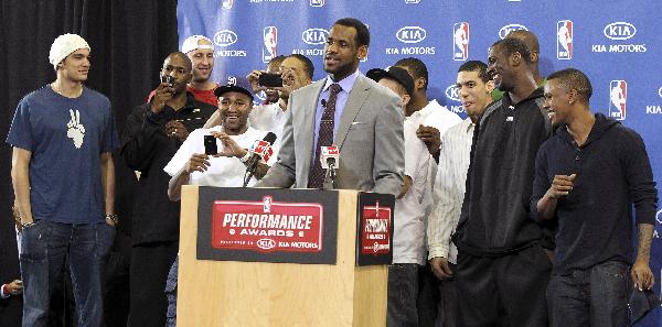 LeBron James of the Cleveland Cavaliers speaks as his Cavalier teammates join him on stage during a ceremony to present James with the NBA's Most Valuable Player award at the University of Akron in Akron, Ohio May 2, 2010. (Xinhua/Reuters Photo)