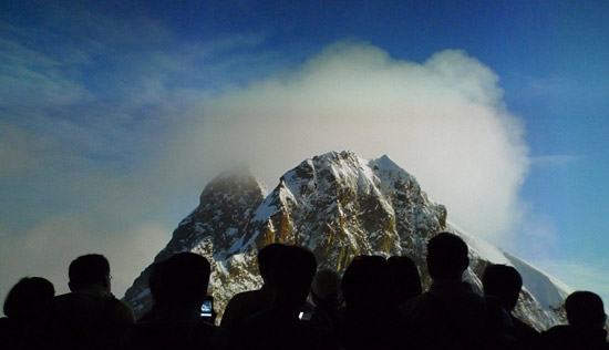 Visitors are enjoying a shortened version of the high-definition IMAX movie 'The Alps' in Swiss Pavilion on May 3, 2010. The movie is tailored specially to a large projection screen. [China.org.cn / Xu Lin] 
