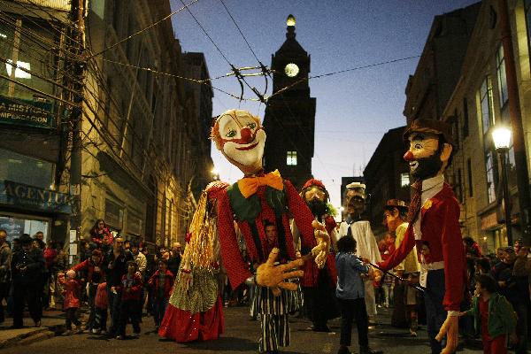 Members of different Chilean groups perform during a clown festival in Valparaiso city, about 120 km (75 miles) northwest of Santiago, May 3, 2010. The city is celebrating the year of Chile's bicentenary with art activities in public places in a lead-up to the country's 200th anniversary of independence on September 18, 2010.