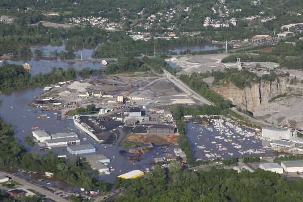 An aerial photo shows a factory submersed by flood in the suburb of Nashville, Tennessee, the United States, May 3, 2010. U.S. authorities confirmed at least 22 people have been killed in floods during the weekend that have been ravaging southern America. [Wang Fengfeng/Xinhua]