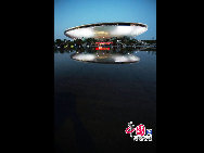 Photo taken on May 4, 2010 shows the beautiful night scene in the World Expo Culture Center in Shanghai, east China. [Photo by Hu Di]