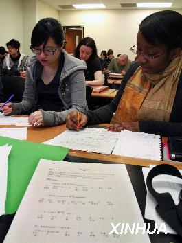 Students study Mandarin in the Confucius Institute at McMaster University in Hamilton, Canada, on March 31, 2010.