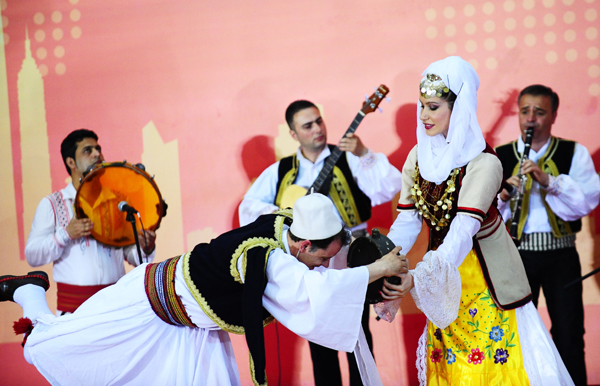 Albanian artists perform during the National Pavilion Day of Albania at the 2010 World Expo in Shanghai, east China, on May 5, 2010. This was the first National Pavilion Day at the Shanghai World Expo. 