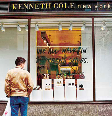 A customer looks at luxury products at a Kenneth Cole store in New York. 
