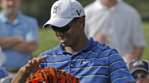 Woods in good mood, Holmes and Allenby lead