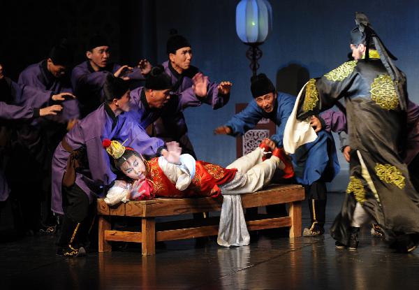 Actors from the Phibada Opera Troupe of the Democratic People's Republic of Korea (DPRK) perform 'A Dream of Red Mansions' in Beijing, capital of China, May 6, 2010. The Phibada Opera Troupe of the DPRK staged in China a Korean adaptation of the Chinese masterpiece 'A Dream of Red Mansions' till May 9.