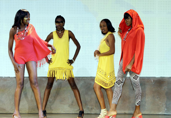 Models present creations during a fashion show at the Africa Joint Pavilion at the 2010 World Expo in Shanghai, east China, on May 7, 2010, to celebrate the National Pavilion Day of Sierra Leone.