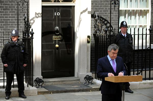 British Prime Minister Gordon Brown speaks to gathered media at Downing Street in London, Friday, May 7, 2010. Britain's two main parties were locked in a power struggle Friday after an inconclusive election — with Labour's Gordon Brown suggesting he would try to form a coalition and Conservative leader David Cameron insisting the prime minister no longer had a mandate to govern.