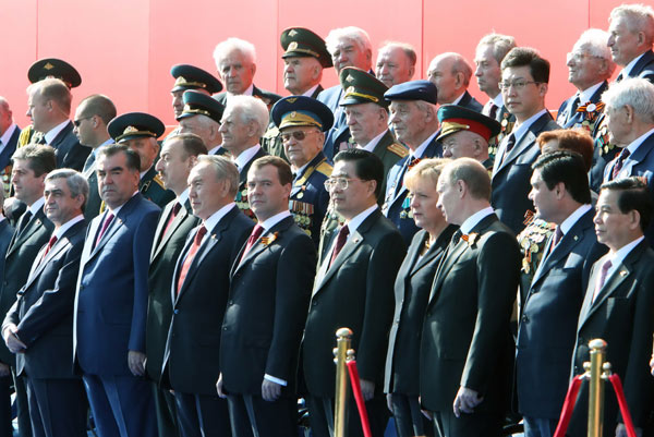 Chinese President Hu Jintao (5th R, front row) joins other state leaders here on Sunday in celebrations marking the 65th anniversary of Russia's victory in the Great Patriotic War against Nazi Germany on the Red Square in Moscow, Russia, May 9, 2010. [Fan Rujun/Xinhua]