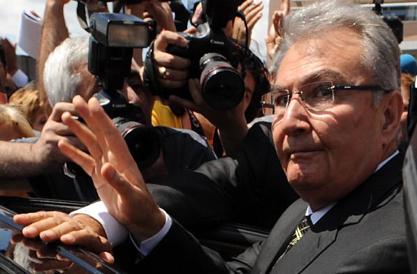 Deniz Baykal, leader of Turkey&apos;s main opposition Republican People&apos;s Party (CHP), leaves a press conference in Ankara, capital of Turkey, May 10, 2010. Deniz Baykal resigned from his post on Monday after the release of a videotape allegedly showing him having an affair with a female lawmaker, Turkish media reported. [Xinhua]