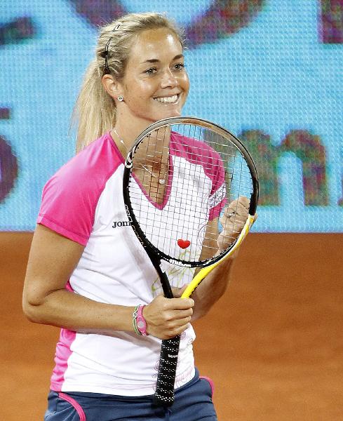 Klara Zakopalova of the Czech Republic celebrates winning against Dinara Safina of Russia after their Madrid Open tennis match May 10, 2010. (Xinhua/Reuters Photo)