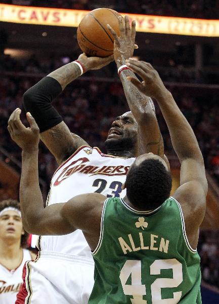 Cleveland Cavaliers' LeBron James (L) shoots over Boston Celtics' Tony Allen during the first quarter in Game 5 of their NBA Eastern Conference playoff basketball series in Cleveland, May 11, 2010. (Xinhua/Reuters Photo)