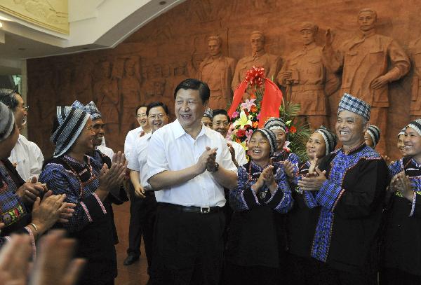 Chinese Vice President Xi Jinping visits a memorial hall of the Baise Revolt in Baise, south China's Guangxi Zhuang Autonomous Region, May 9, 2010. Xi went to Baise and Nanning from May 9 to 11 for an investigation. [Xinhua]