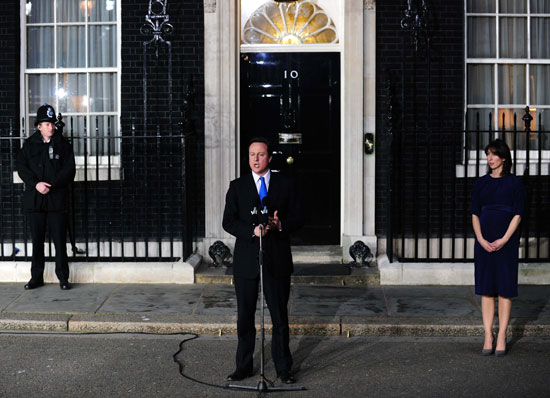 Britain's new Prime Minister Conservative party leader David Cameron speaks in front of 10 Downing Street in London, on May 11, 2010. Cameron was appointed by Britain's Queen Elizabeth II as new prime minister.