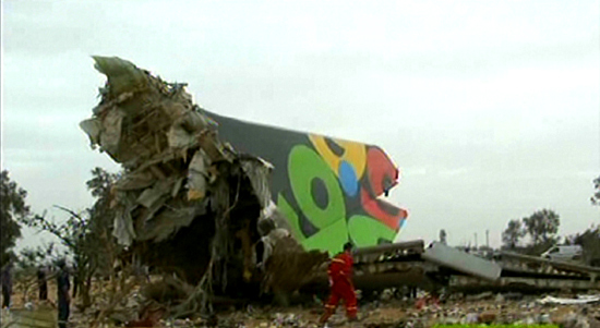 This image from Libyan television showsa section of the fuselage from the Afriqiyah&apos;s flight 771 amid the wreckage Wednesday May 12, 2010. [Xinhua photo]