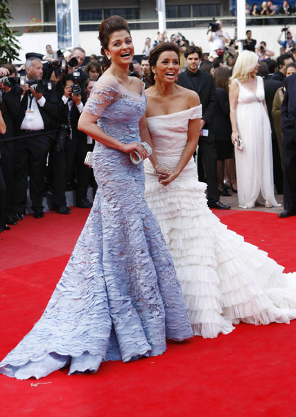 US model and actress Eva Longoria(R) and Indian actress Aishwarya Rai arrive for the opening ceremony and screening of 'Robin Hood' presented out of competition at the 63rd Cannes Film Festival in Cannes, France, May 12, 2010. 