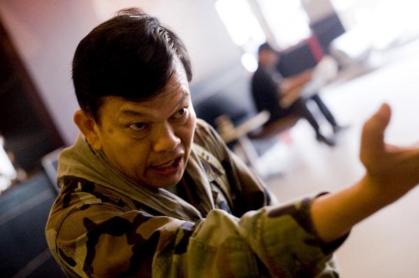 Amid the intense political situation due to the antigovernment rally in central Bangkok, an anti-government leader, Maj-General Khattiya Sawasdipol, on Thursday evening was shot and suffered a severe gun wound on his head. This photo shows Sawasdipol was giving an interview with AFP on May 11, 2010. [Xinhua]