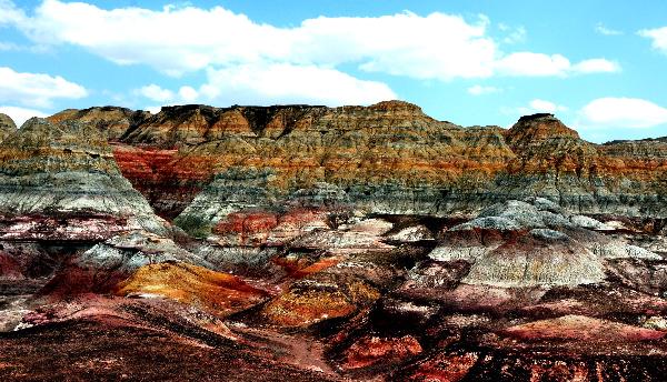 Photo taken on April 29, 2010, shows the view of Wucaiwan in a desert of Jimsar County of Hui Autonomous Prefecture of Changji in northwest China's Xinjiang Uygur Autonomous Region. [Xinhua/Yang Shiyao]