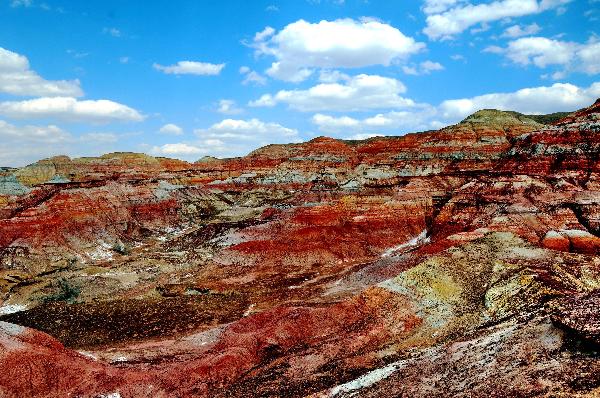 Photo taken on April 29, 2010, shows the view of Wucaiwan in a desert of Jimsar County of Hui Autonomous Prefecture of Changji in northwest China's Xinjiang Uygur Autonomous Region. [Xinhua/Yang Shiyao] 