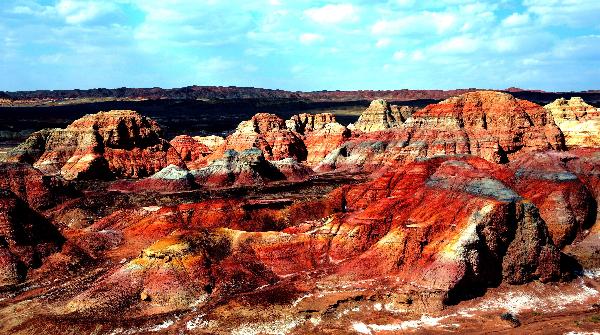 Photo taken on April 29, 2010, shows the view of Wucaiwan in a desert of Jimsar County of Hui Autonomous Prefecture of Changji in northwest China's Xinjiang Uygur Autonomous Region. [Xinhua/Yang Shiyao]