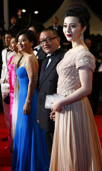 Cast members arrive for the screening of the film 'Rizhao Chongqing' (Chongqing Blues) presented in competiton at the 63rd Cannes Film Festival in Cannes, France, May 13, 2010.