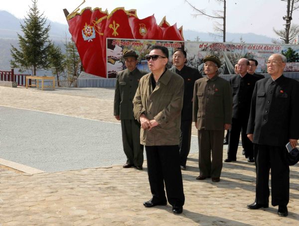 Photo released by the Korean Central News Agency (KCNA) on May 17, 2010 shows Kim Jong Il (front), general secretary of the Workers' Party of Korea and chairman of the National Defense Commission of the Democratic People's Republic of Korea (DPRK), inspects the construction site of the Paektusan Songun Youth Power Station. [Xinhua]