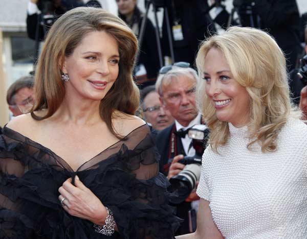 Queen Noor Al Hussein of Jordan and former CIA operative Valerie Plame Wilson arrive on the red carpet for the screening of the film 'Biutiful' by director Alejandro Gonzalez Inarritu, which is in competition during the 63rd Cannes Film Festival May 17, 2010. Nineteen films are competing for the prestigious Palme d'Or which will be awarded on May 23.