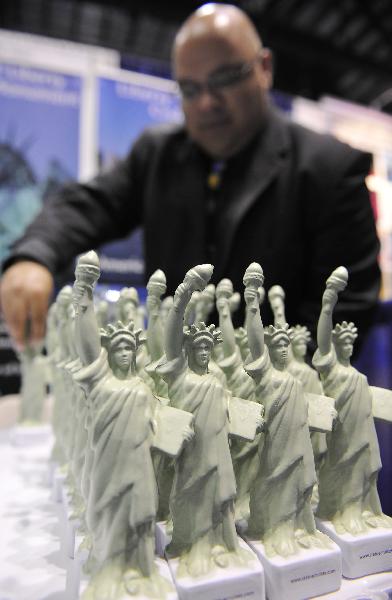 Figurines of the Statue of Liberty are shown during the 2010 International POW WOW at the Orange County Convention Center in Orlando, Florida, the United States, May 17, 2010.