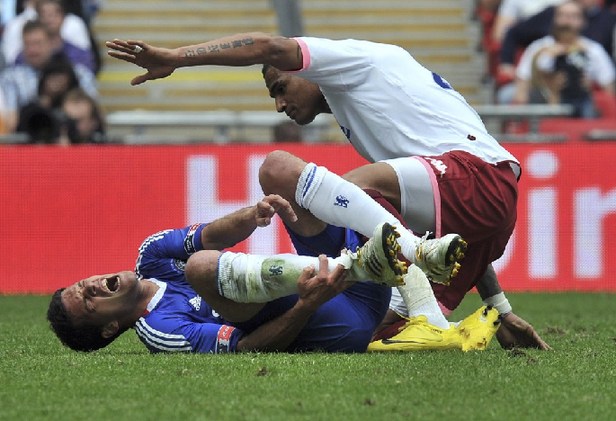 Ballack ruled out of World Cup for ankle injury.