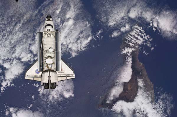 The Space Shuttle Atlantis is backdropped against the Earth prior to docking with the International Space Station in this handout photo provided by NASA and taken May 16, 2010.