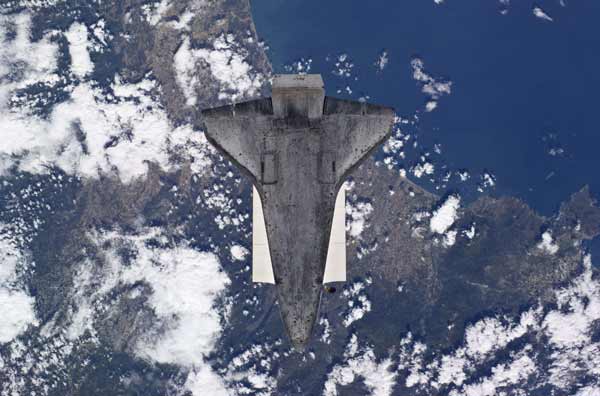 The underside of the Space Shuttle Atlantis is visible prior to docking with the International Space Station in this handout photo provided by NASA and taken May 16, 2010. 