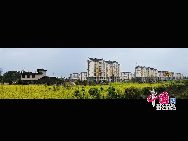 Photo taken on May 14, 2010 shows the new scenery of Dujiangyan city, Sichuan Province. Two years after the Wenchuan earthquake that devastated southwest China's Sichuan Province, the once picturesque area is sporting a brand new look. [Photo by Liu Xingguo]