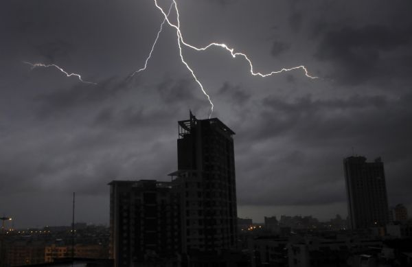 Photo taken on May 19, 2010 shows a lightning over the downtown area of Liuzhou City, southwest China&apos;s Guangxi Zhuang Autonomous Region. According to the weather forecast of Guangxi Observatory, a heavy rainfall will hit the north and east of Guangxi from Wednesday to Thursday. [Xinhua] 